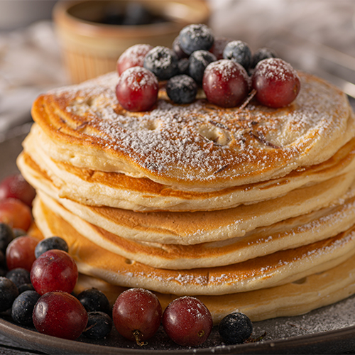 Stack of pancakes with berries